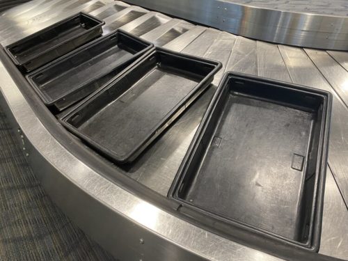 Luggage Bins on Conveyor